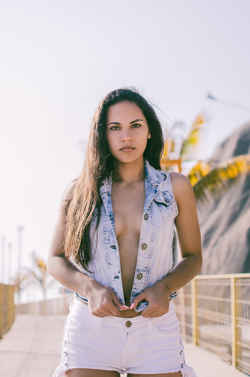 woman in blue vest